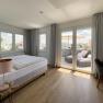 Bedroom 1 with a balcony, © Kay Haderer